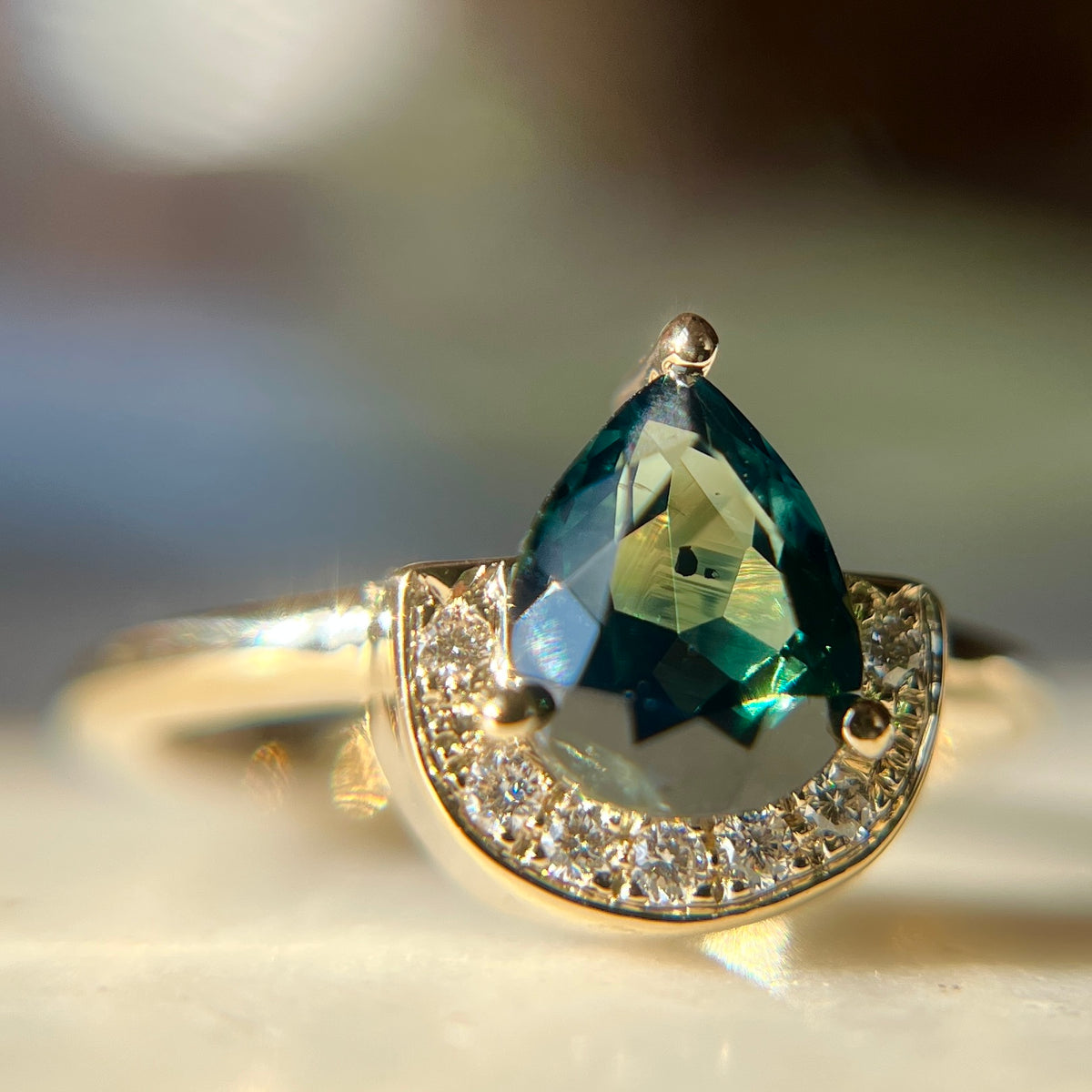 Blue green store sapphire engagement rings